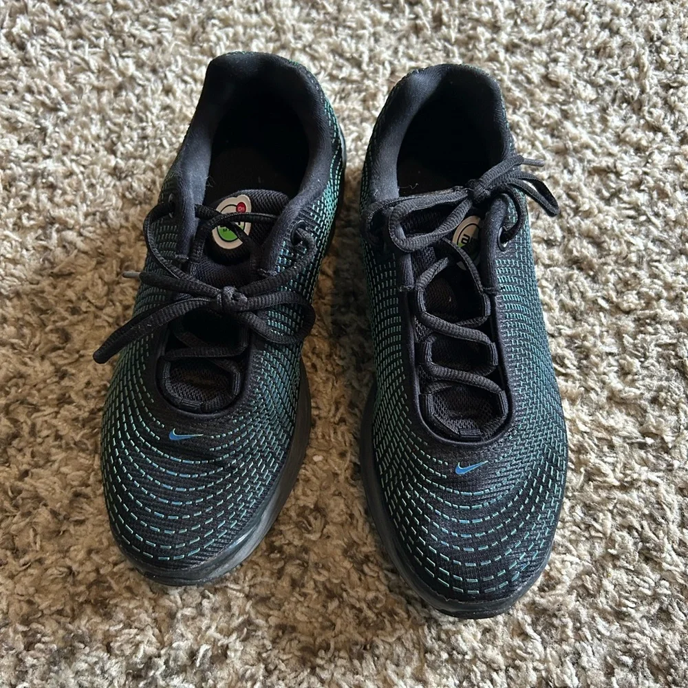 Nike Black Sneakers with Teal Knit Accents